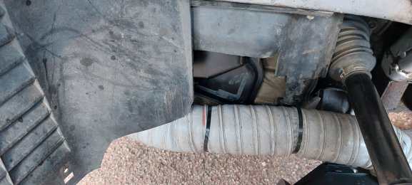 Modified gearbox side hose routing