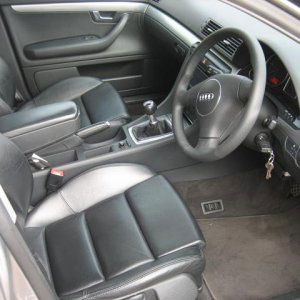 full leather with centre arm rest