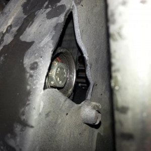 Why is there a hole in my can belt cover?