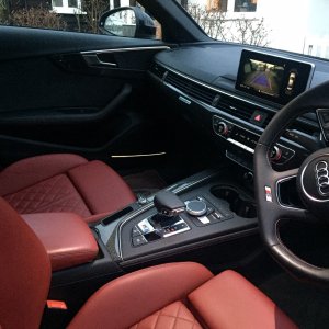 Loving the Red Leather seats and Carbon Atlas Trim